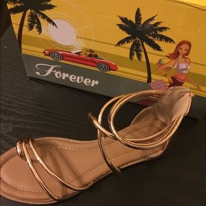 Rose gold gladiator sandals